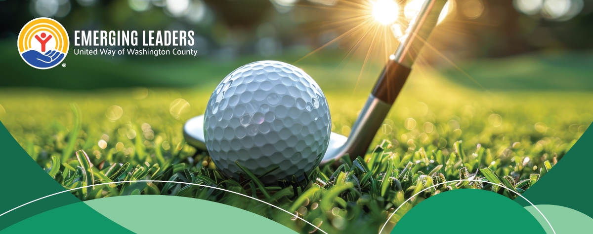 Photo of golf ball on grass with golf club next to it.