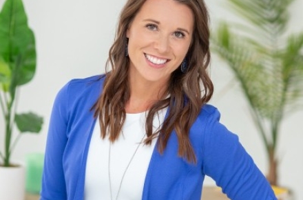 Photo of speaker, Julie Menden, wearing a white shirt with blue jacket.
